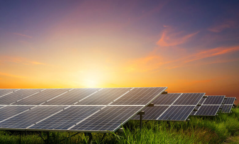 Solar panel on dramatic sunset sky background, Alternative energ