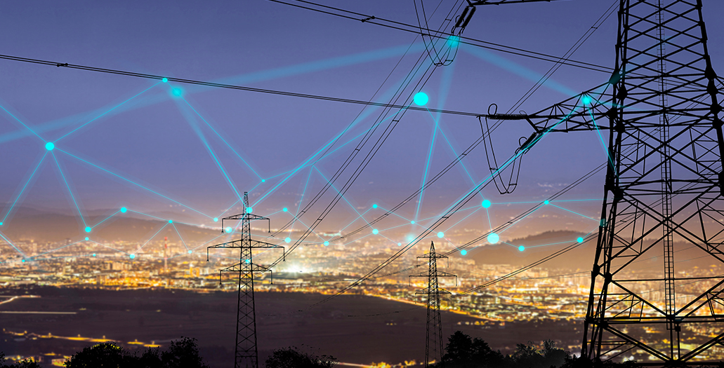 High,Power,Electricity,Poles,In,Urban,Area,Connected,To,Smart